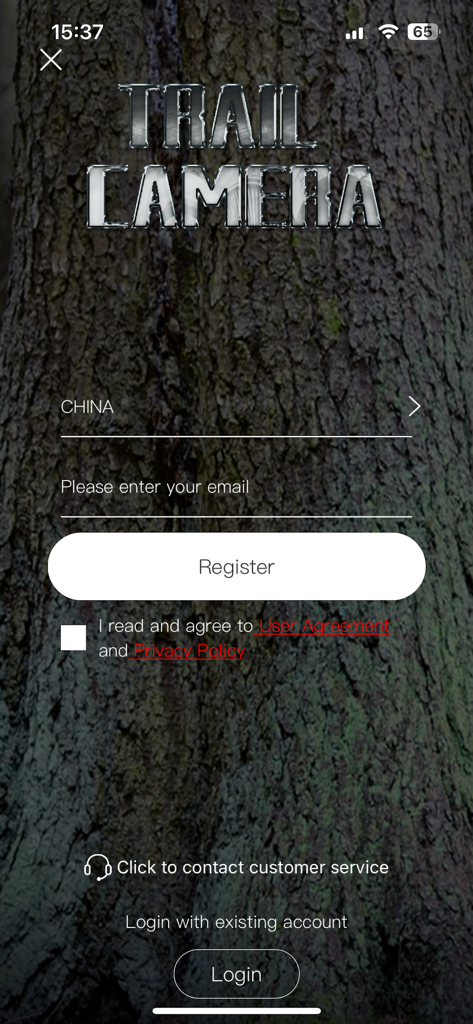 Ucon - Registration screen of the Ucon cellular trail camera app featuring a rustic tree bark background.
