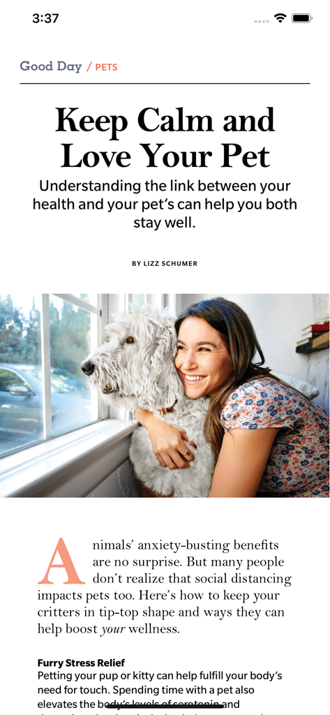 Woman's Day Magazine US - A digital magazine article about pet wellness featuring a woman hugging a white dog