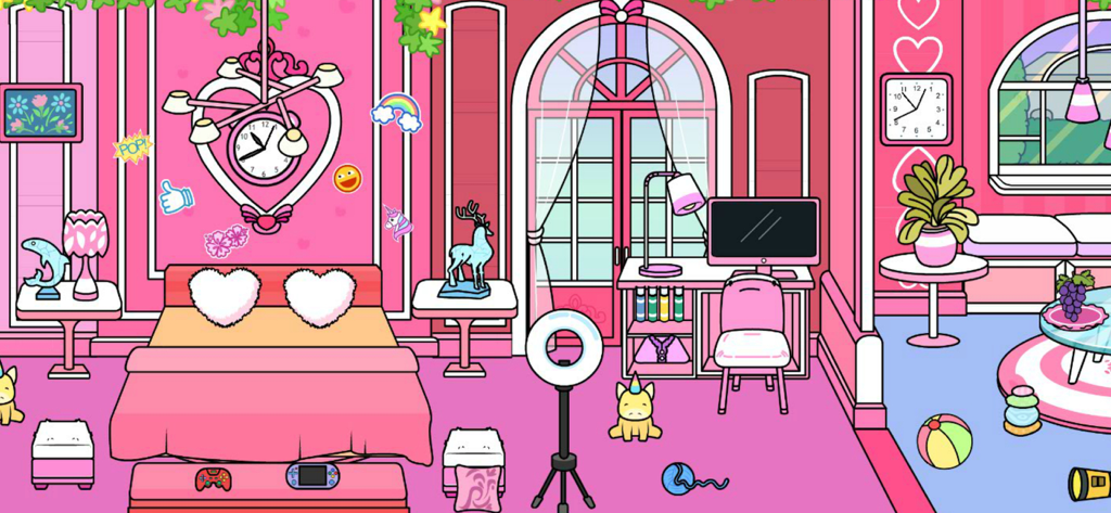 Pink Home Design - Girl Games - A cartoon-style pink bedroom and home office with a heart-shaped clock, pink bed, and gaming desk.