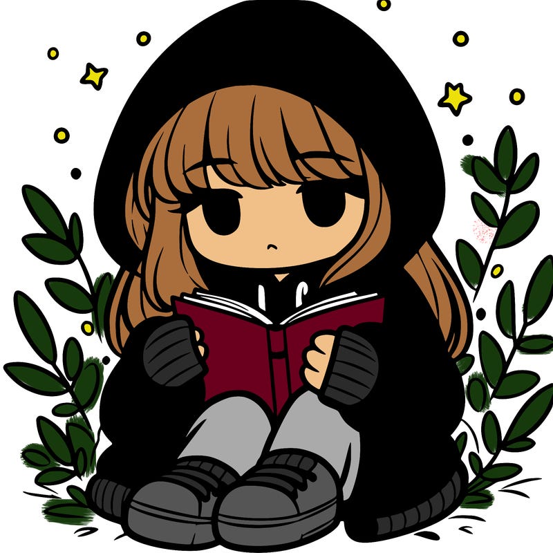 girl in oversized hoodie reading a book