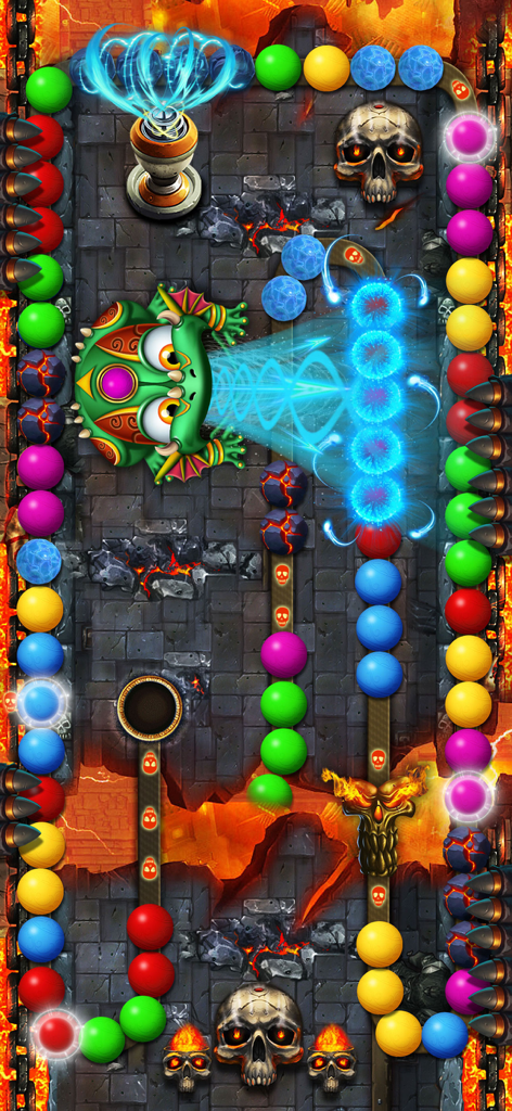 Una rana verde disparando canicas de colores en un nivel temático de mazmorra de Zumba Classic Marble Blast.