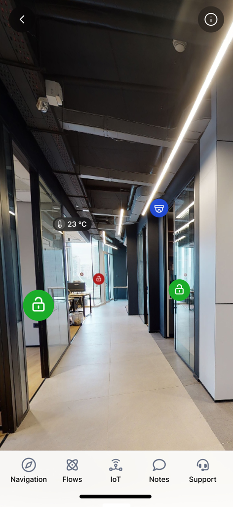 Augmented reality view of an office hallway showing temperature and security IoT data overlays