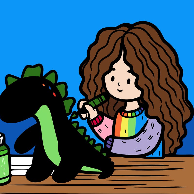 moriah elizabeth painting a green dinosaur plushie