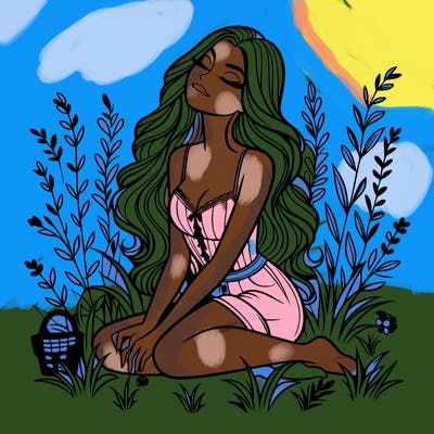 beautiful woman sitting on the grass