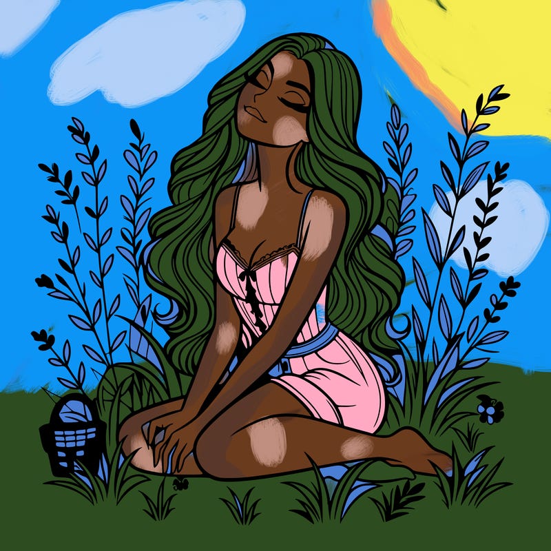 beautiful woman sitting on the grass