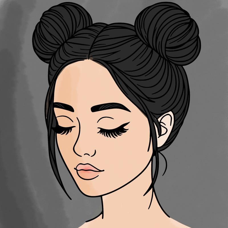 woman with hair buns