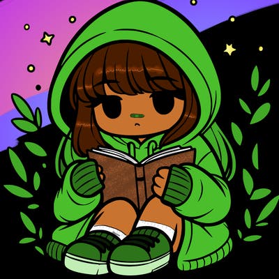 girl in oversized hoodie reading a book