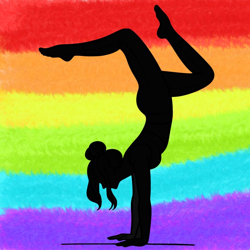 a woman doing a handstand