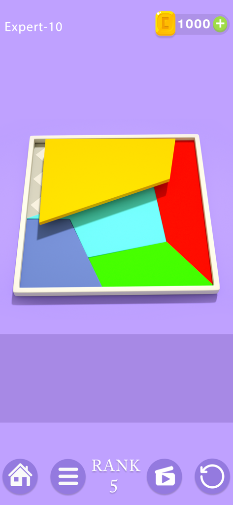 A colorful tangram block puzzle from the Puzzledom mobile game at expert level 10