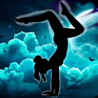 a woman doing a handstand