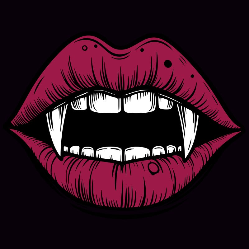 lips with vampire teeth