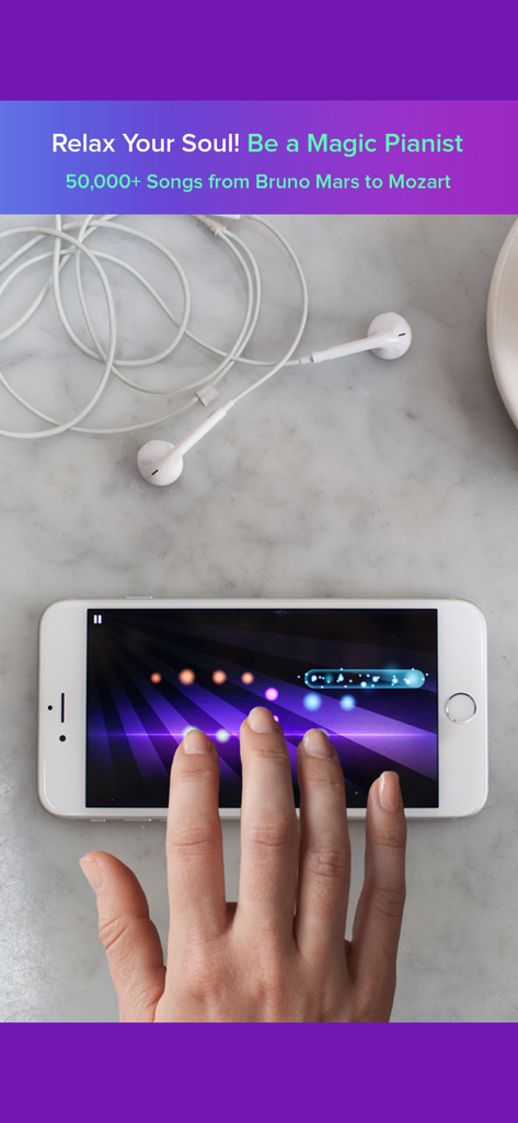 A hand playing the Magic Piano rhythm game on an iPhone with glowing note beams