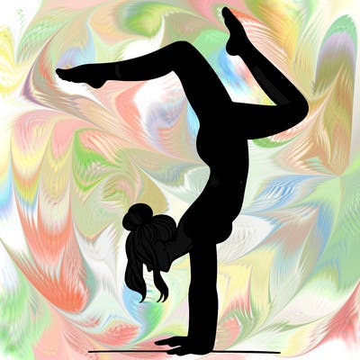 a woman doing a handstand