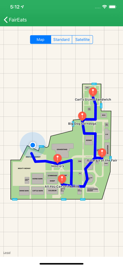 Map view of the FairEats app displaying a navigation route between various food vendors at the Minnesota State Fair