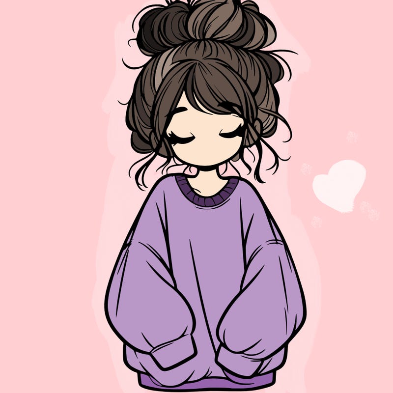girl with baggy sweatshirt and messy bun