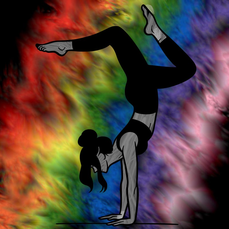 a woman doing a handstand