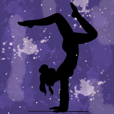 a woman doing a handstand