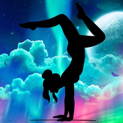 a woman doing a handstand