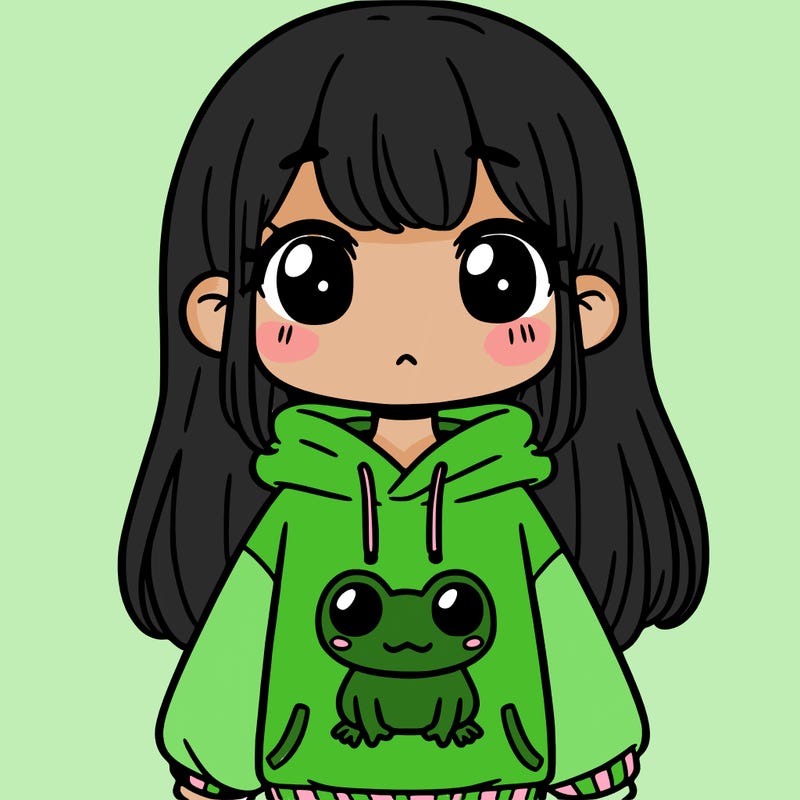 girl wearing frog sweatshirt