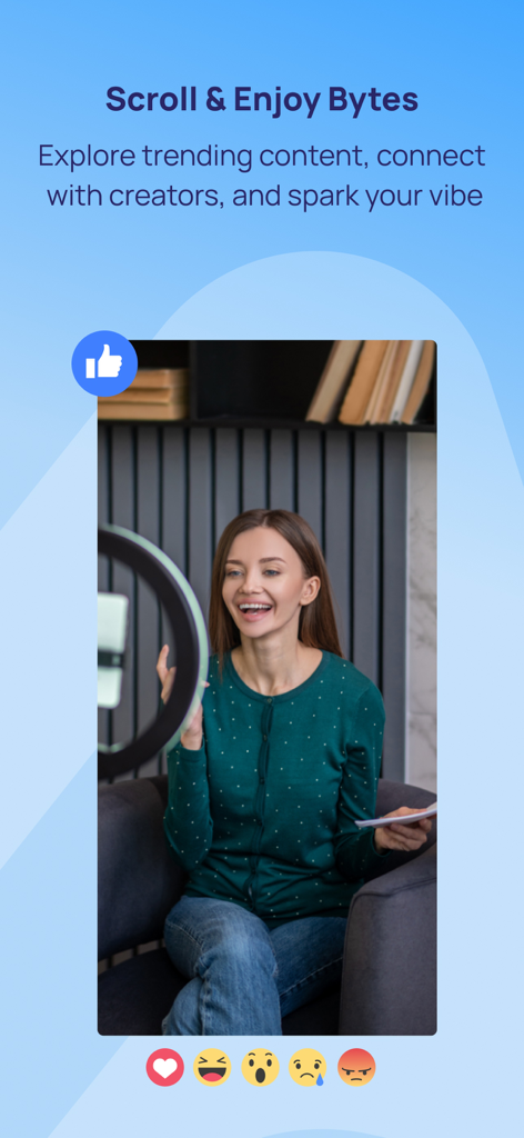 Reab: Safe Social & Supper App - A woman creator recording video content on the Reab safe social platform with interactive emoji reactions.