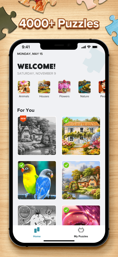 Jigsaw Puzzles: Puzzle Game HD - 다양한 카테고리에 걸쳐 4000개 이상의 퍼즐이 있는 직소 퍼즐 퍼즐 게임 HD의 홈 메뉴를 표시하는 스마트폰 화면.