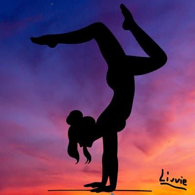 a woman doing a handstand