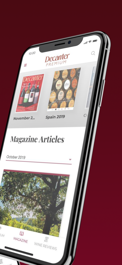 Écran de smartphone montrant l'application Decanter Premium avec des numéros de magazine de vin et des articles