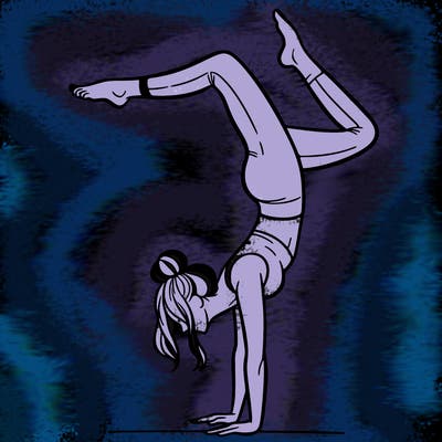 a woman doing a handstand