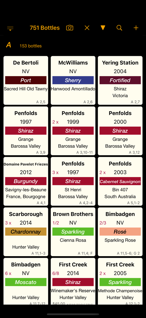 Personal Wine Cellar Database app displaying a grid of wine bottle entries with details like producer vintage and storage location