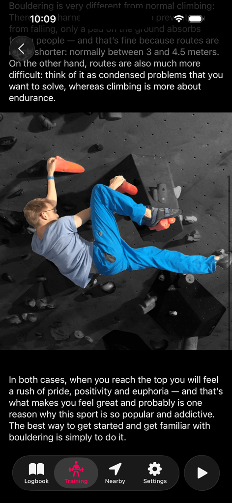 Redpoint: Bouldering, Climbing - A man climbing a bouldering wall in an indoor gym