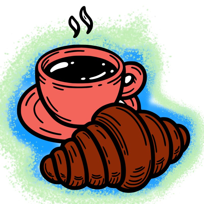 a croissant with a cup of coffee