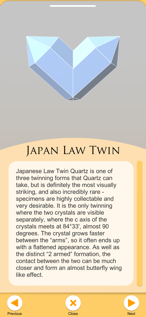 Uma descrição e ilustração geométrica de uma formação de cristal de quartzo Gêmeo Lei do Japão no aplicativo Um Guia Para Cristais