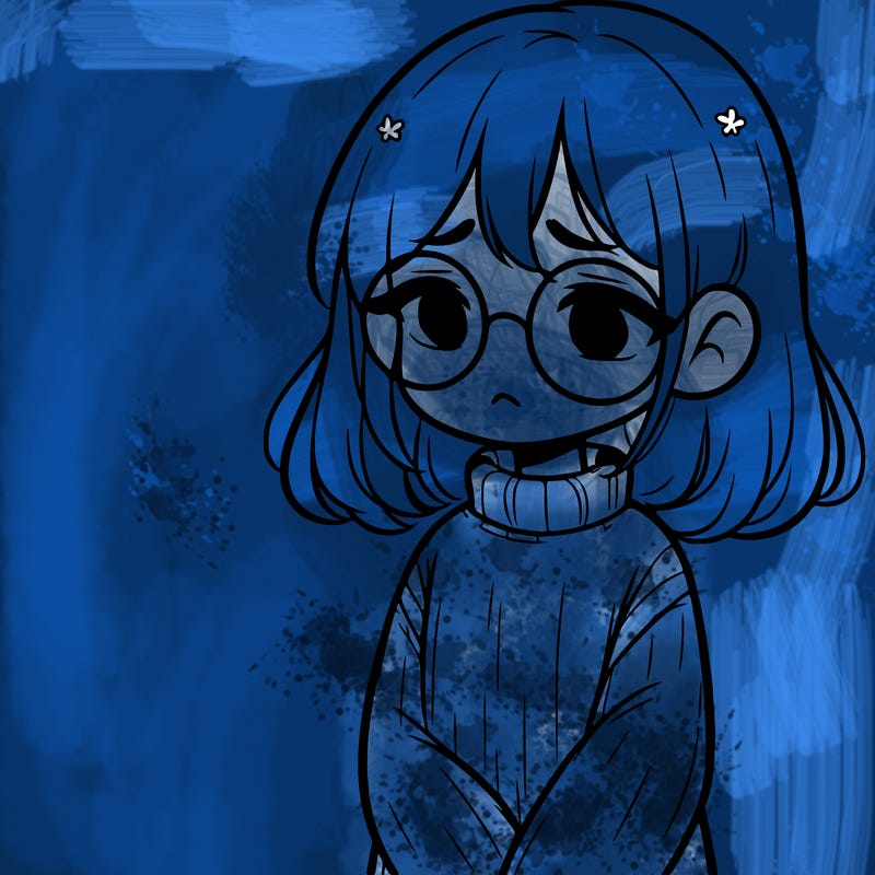 sad girl with glasses in a sweater