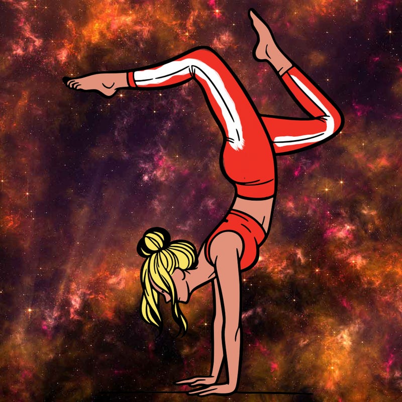 a woman doing a handstand