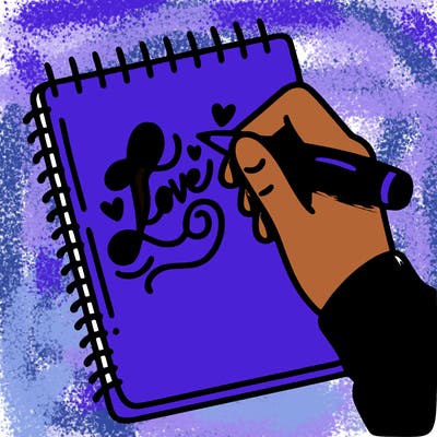 a hand writing “love” in calligraphy on a notebook