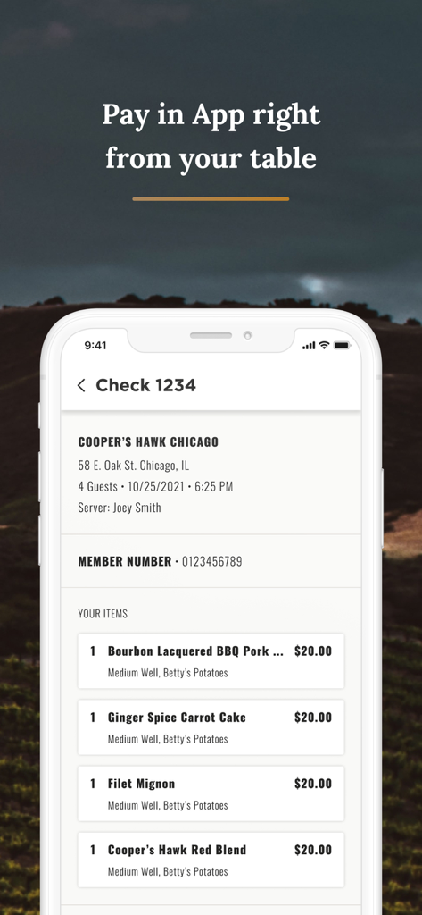 Smartphone screen displaying a dining check in the Cooper's Hawk app with the option to pay from the table