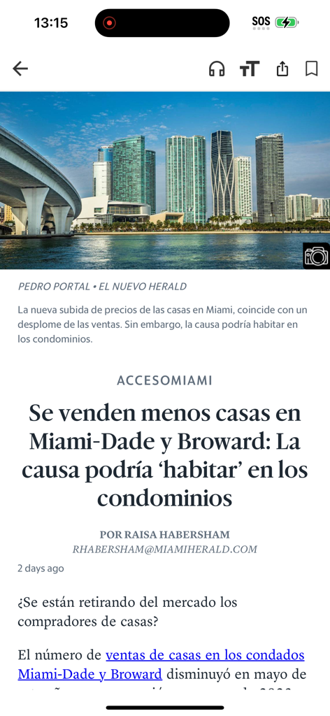 El Nuevo Herald app mostrando un artículo de noticias sobre el mercado inmobiliario de Miami.