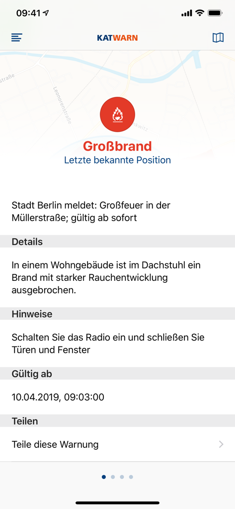Captura de tela do aplicativo KATWARN mostrando um alerta de incêndio de grande porte em Berlim com instruções oficiais de segurança