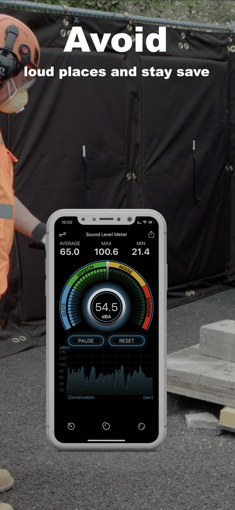 Smartphone displaying the Sound Meter app interface with a decibel gauge and noise level graph at a construction site