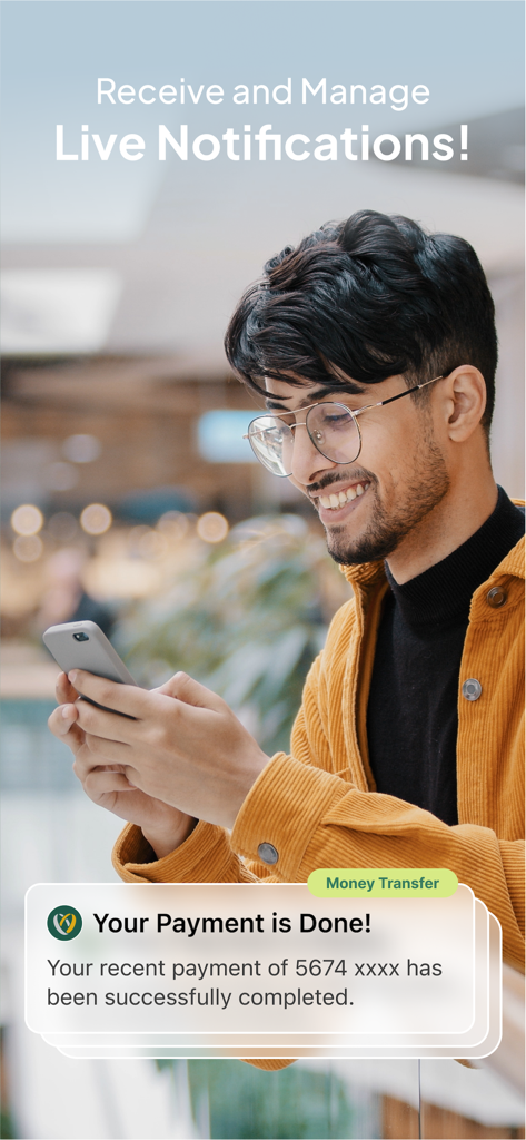 Joyalukkas Exchange - Ein Mann lächelt über eine erfolgreiche Zahlungsbenachrichtigung in der Joyalukkas Exchange Geldtransfer-App