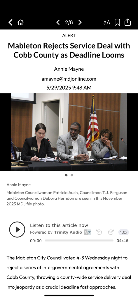 Marietta Daily Journal - Interface of the Marietta Daily Journal app showing a local news article about Mableton with an integrated audio player