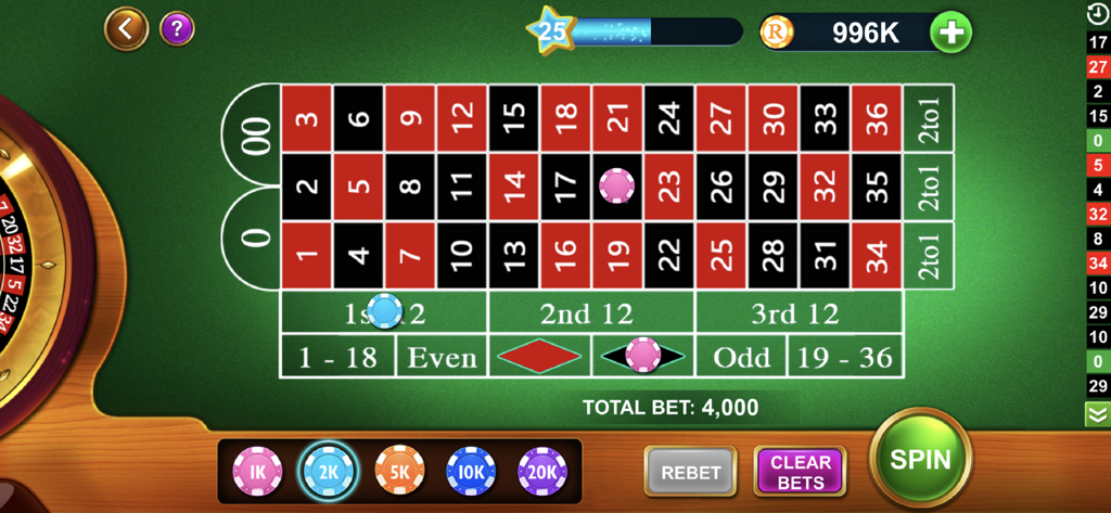 A virtual American roulette table interface with chips placed on the betting grid and a spin button.