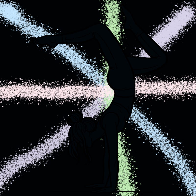 a woman doing a handstand