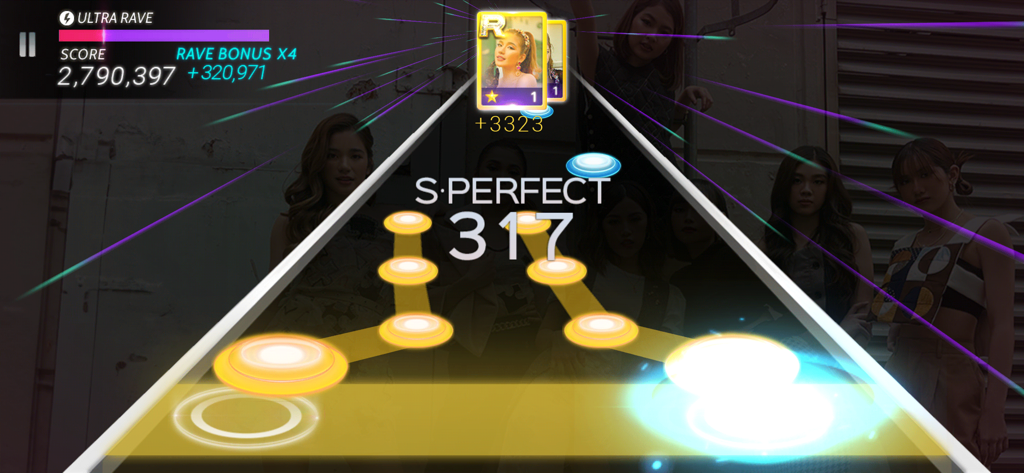 SuperStar PHILIPPINES - Gameplay screen of SuperStar PHILIPPINES rhythm mobile game showing note hitting action and artist cards