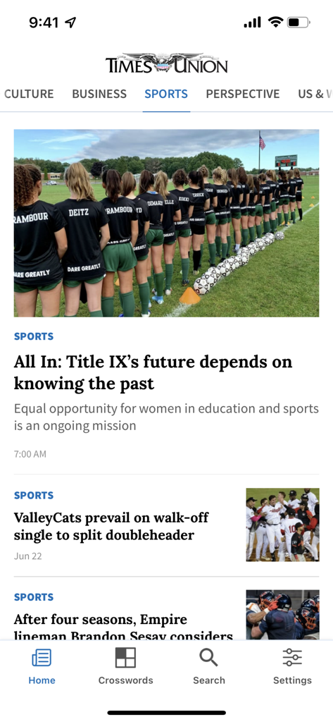 Times Union app sports section featuring local articles on Title IX and local sports teams.