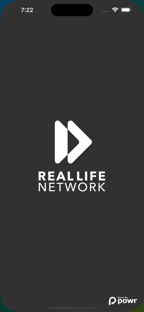 Real Life Network - Real Life Network app splash screen featuring the white logo and brand name on a dark background