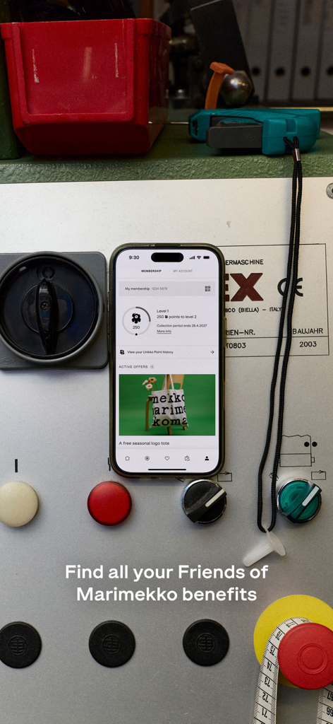 Marimekko | Fashion & Design - A smartphone displaying the Marimekko app loyalty rewards and membership points page