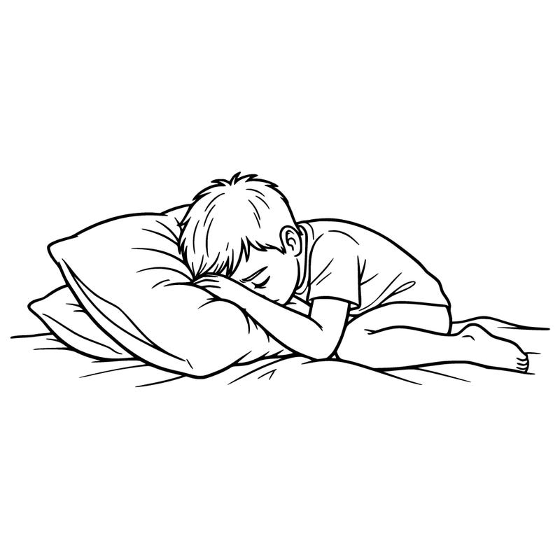 sad boy laying with head down on pillow