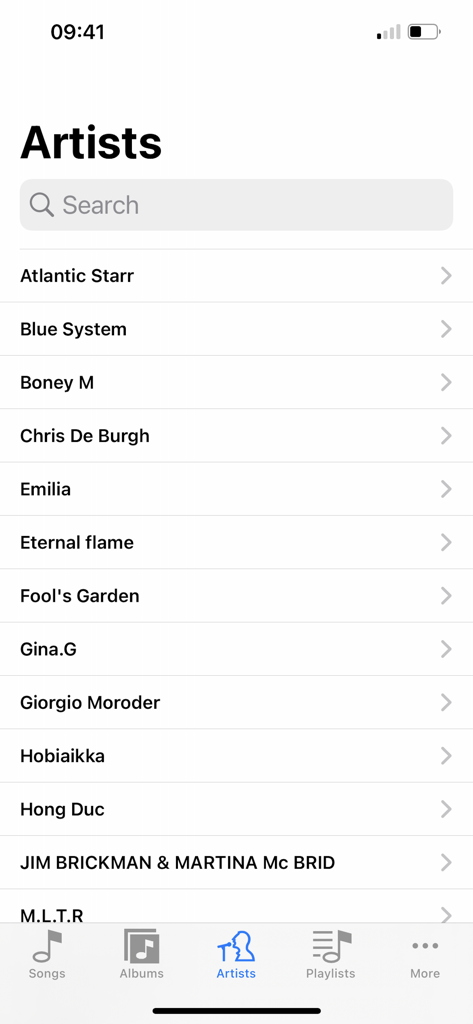 FLAC Player+ - Screenshot of the Artists library view in the FLAC Player plus app showing a list of music artists and navigation menu