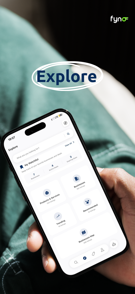 Fynd Rwanda - Person using the Fynd Rwanda app to explore local businesses and services on their smartphone